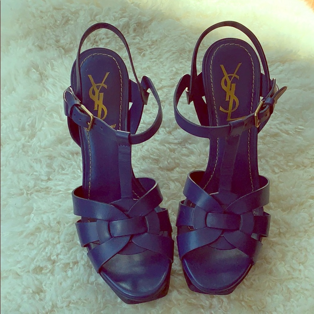 Yves Saint Laurent
Blue ysl tribute sandal. (*Moving Sale)
